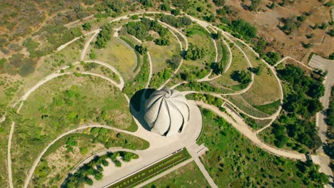 Aerial-View-Of-Bahai-Temple-And-Garden-On-A-Sunny-Day-In-Santiago,-Chile