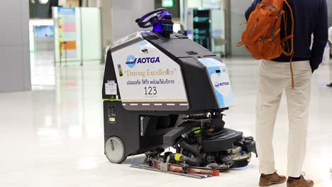 autonomous cleaning robot in airport terminal