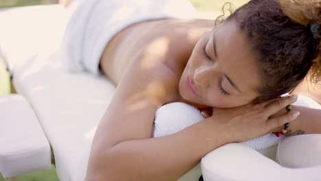 Top-down-view-of-woman-on-massage-table