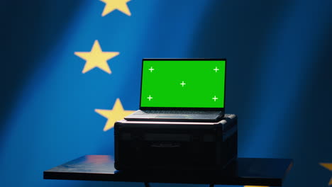 technician doing cybersecurity job for european union with mockup notebook