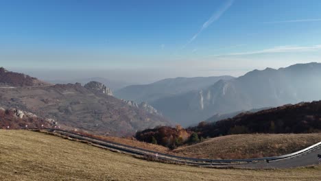 drone footage of hills and rocky cliffs with interesting shapes during the season of colors, fall.