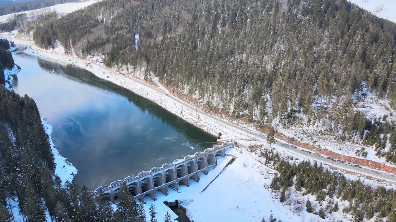 Aerial overview of the Linachtalsperre dam in Black Forest, Germany at winter time