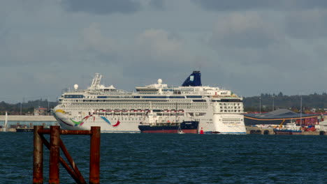 a shot of a single cruise ship moored up at southampton cruise terminal bunkering fuel