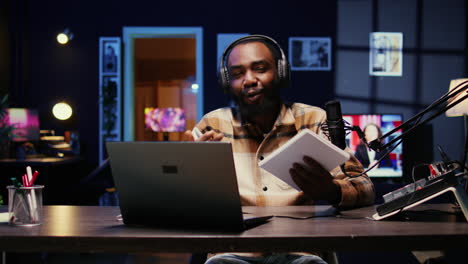 man following discourse script on paper, presenting today video topic