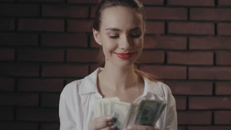 Happy-woman-counting-money