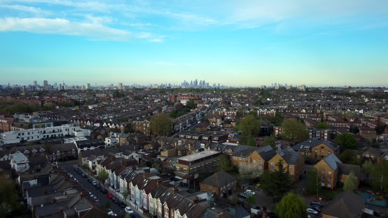 Fast drone shot flying backwards over South London residential suburb