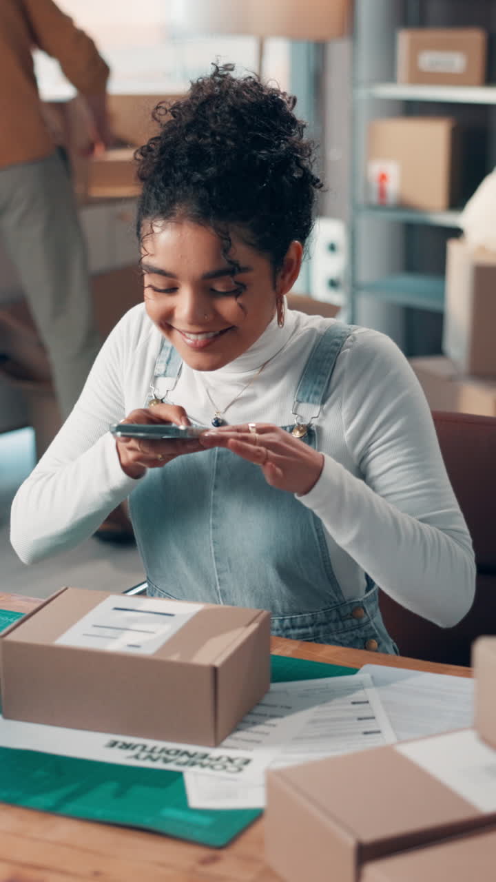 Young Woman Taking Photo of Package for Her Online Business