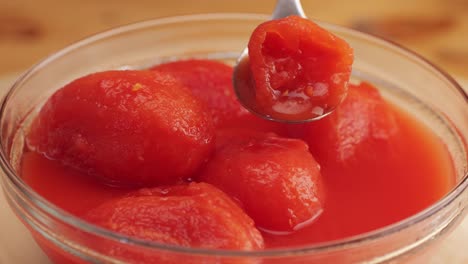 canned tomatoes in glass bowl