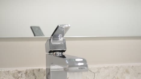 jib motion, moving upward to reveal the full faucet