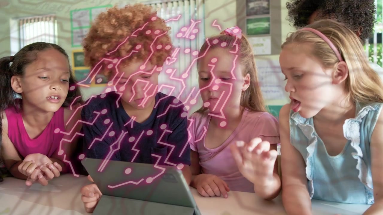 Children leaning around tablet tapping and pointing, pink dots forming circuit overlay for learning