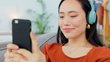 phone, music and social media with an asian woman