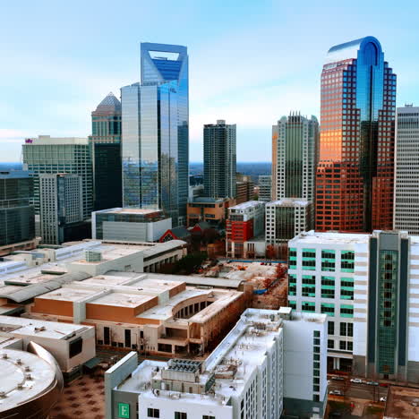 low-rise architecture neighboring with beautiful modern skyscrapers. cityscape of charlotte, north carolina, usa from top.