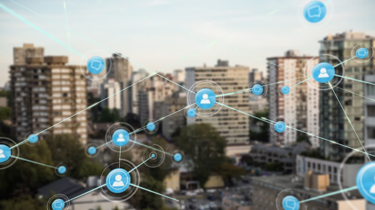 animación de una red de iconos de perfil contra una vista aérea de edificios altos