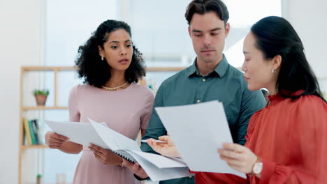 Teamwork,-documents-and-business-people-in-office