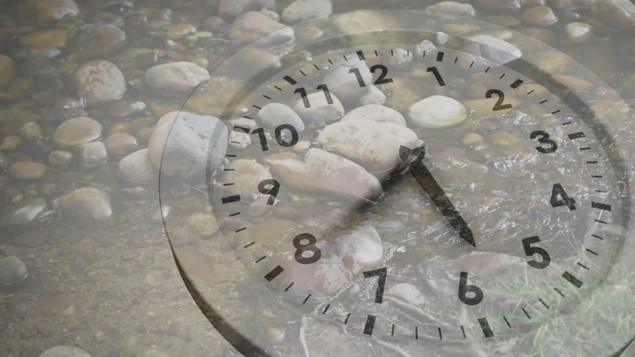 Playback triggers clock hands over pebbles sweeping in minutes under flowing water symbolizing time