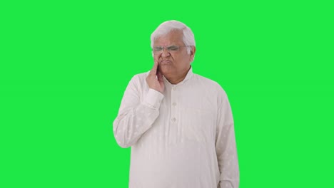 Sick-Indian-old-man-suffering-from-tooth-pain-Green-screen