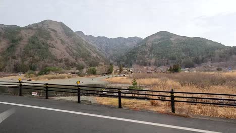 japanese village by a mountain lake