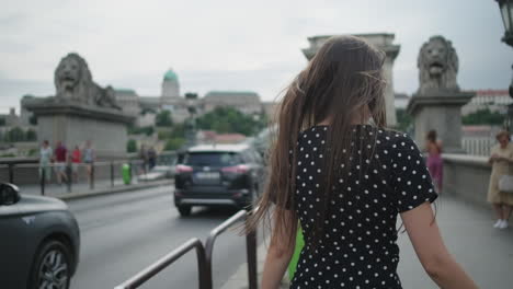 woman on a budapest bridge