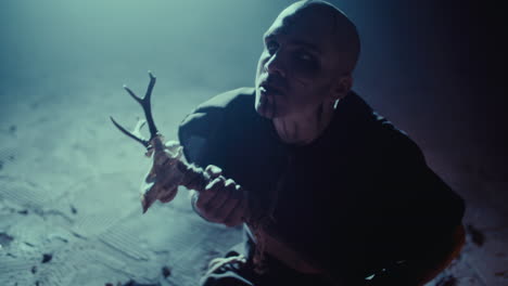 dark ritualistic figure