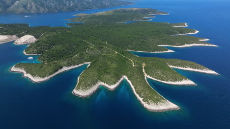 pakleni islands (pakleni otoci) in the adriatic sea with blue water in croatia. - aerial shot