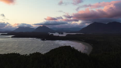 High-angle-view-over-scenic-Tofino-coastline-with-exquisite-sunset-sky,-Cox-Bay