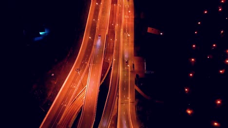 Night-Aerial-view-of-a-freeway-intersection-traffic-trails-in-night-Moscow