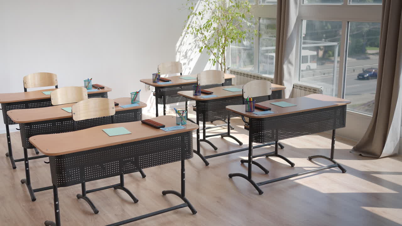 A school office during a pandemic with masks and social distance. The school is preparing to work in the mode of a coronavirus pandemic and epidemic. The interior of the school classroom