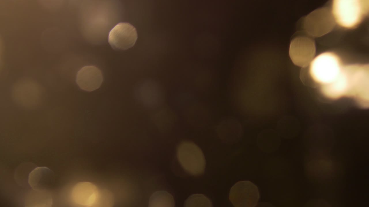 Luci Bokeh Dorate Astratte Scintillanti e Sfumate