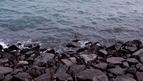 Sea-waves-crushing-onto-the-rocky-shore-in-slow-motion