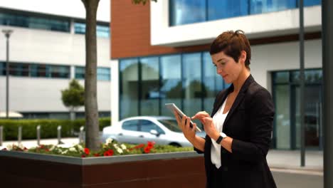 businesswoman using digital tablet