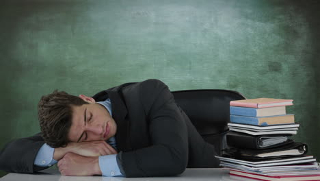 businessman sleeping on desk