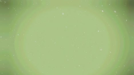 animation of snow falling over green background