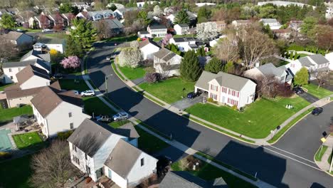 aerial establishing shot of neighborhood in spring