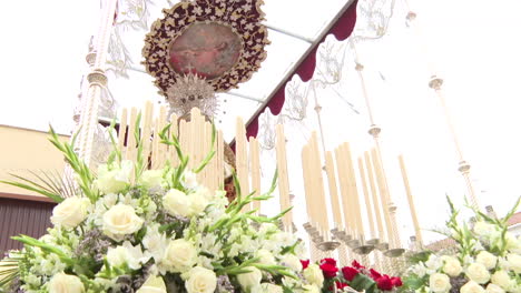 religious procession with floral decorations