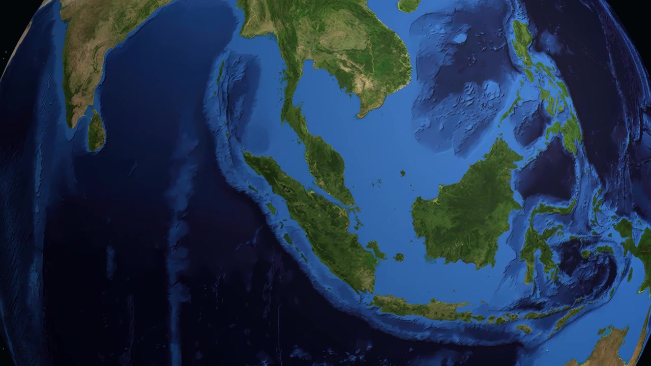 Un globo digitale ruota e ingrandisce dallo spazio un indicatore di città specifico in Malesia