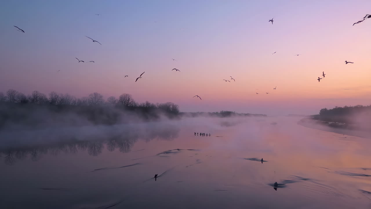 Misty Sunrise over a River with Birds