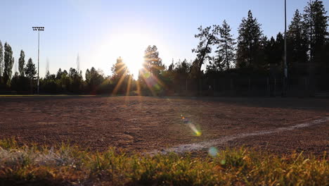 baseball field dolly shot with clear sunrise