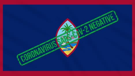 guam swaying flag with green stamp of freedom from coronavirus, loop