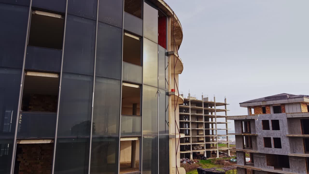 Aerial view of construction site with modern buildings under development