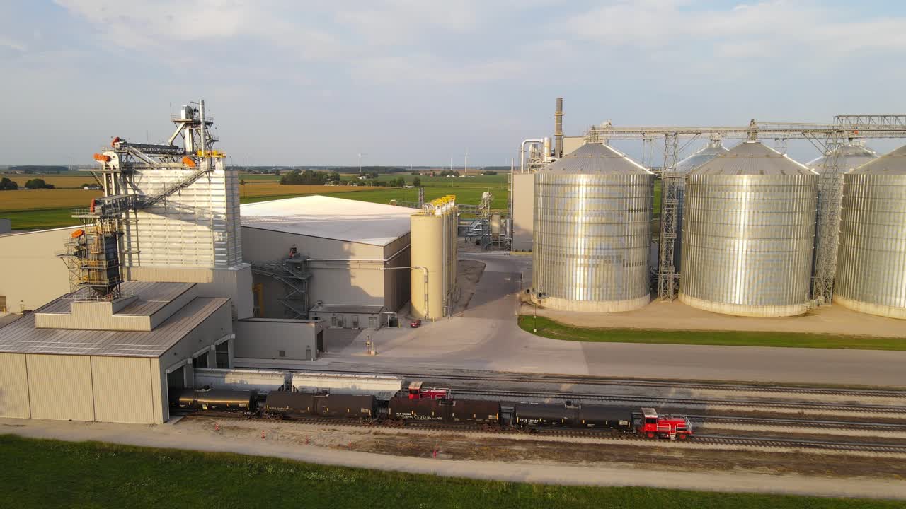 Industrial silos near railway system in Michigan, USA, aerial view