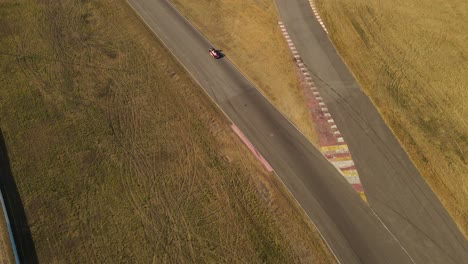 Sports-car-running-on-racing-circuit-of-Buenos-Aires,-Argentina