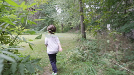 child running in woods