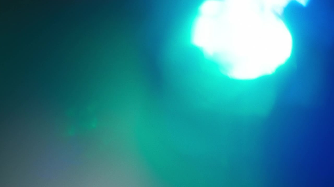 Abstract prism overlays of gradient blue and green colors with light leaks