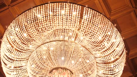 glass large chandelier in theater