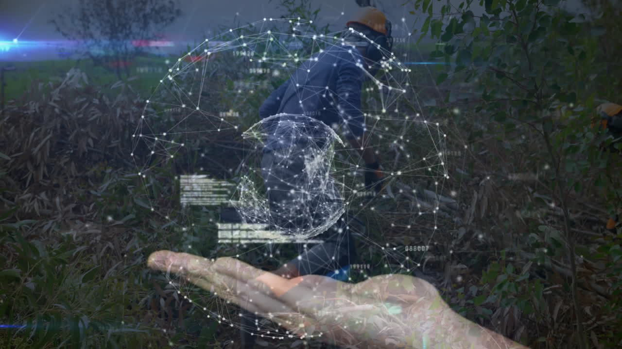 colleague wearing helmet trimming shrubs outdoors, displaying holographic technology network sphere