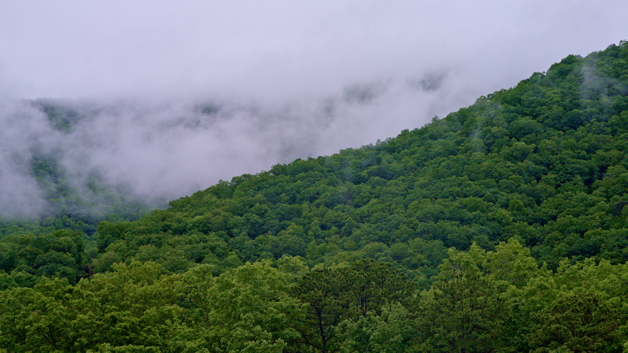 Cloudy cinematic drone view over the Smoky Mountains.