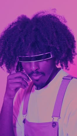 retro-futuristic portrait of a man in a visor with neon lighting