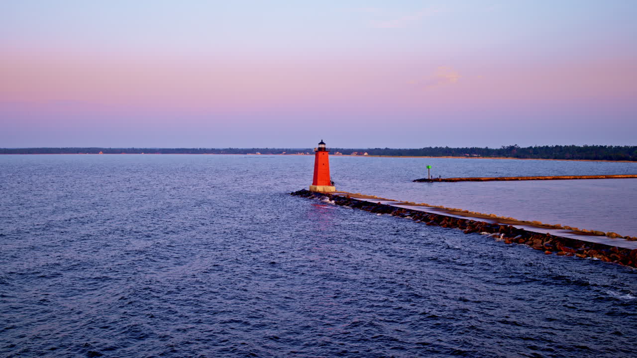 LIghthouse out on a breakwater in lake MIchigan in the Upper Peninsula of Michigan