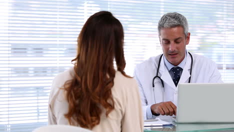 doctor discussing with a patient