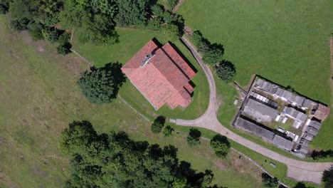 Cenital-view-of-the-Serrapio-Church,-a-13th-century-architectural-gem-in-the-heart-of-Asturias